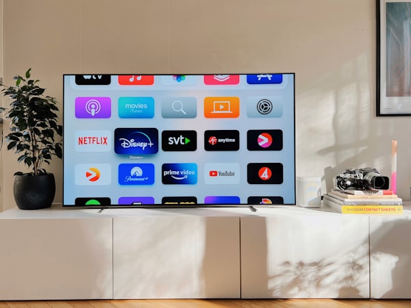 Flat-screen television on a white cabinet